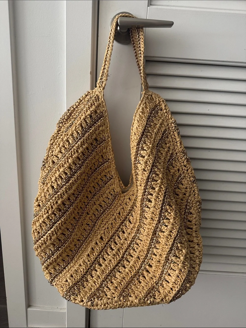 Roomy Raffia tote with lined interior.